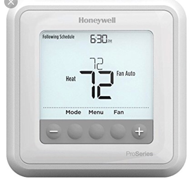 Digital thermostat at 72 degrees with options for heat, fan auto, mode, menu, and fan—ideal for quick AC repair near me.